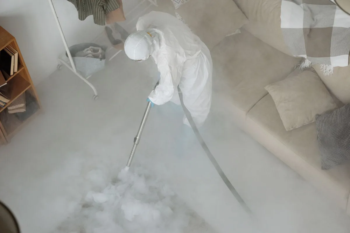 Biohazard cleanup technician in protective equipment, Pendleton, OR